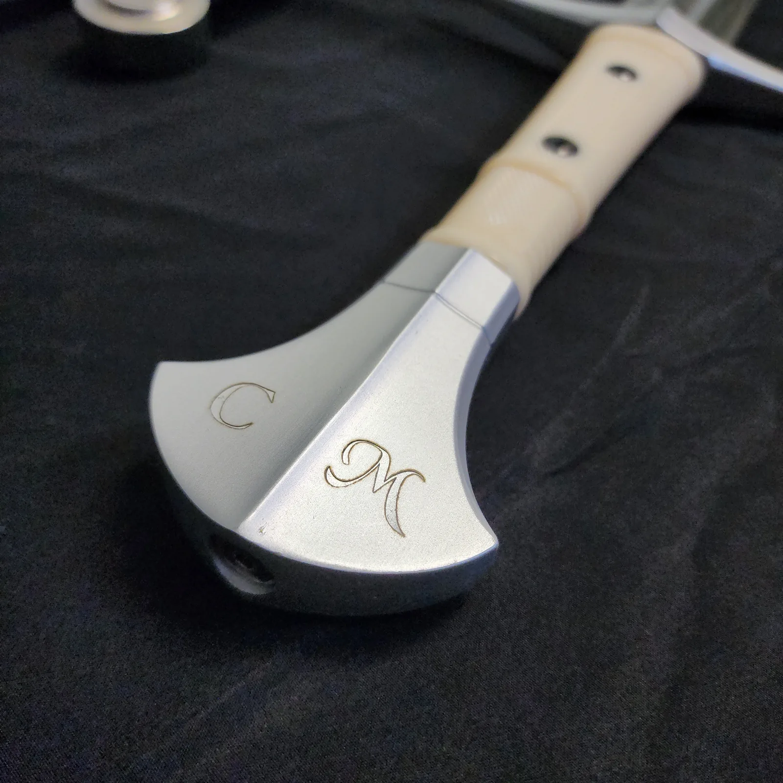 Engraved sword handle